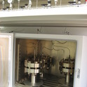 High pressure fluid exposure test system