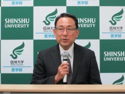 平成28年8月25日に行った記者会見において、今後の抱負を語る田中教授