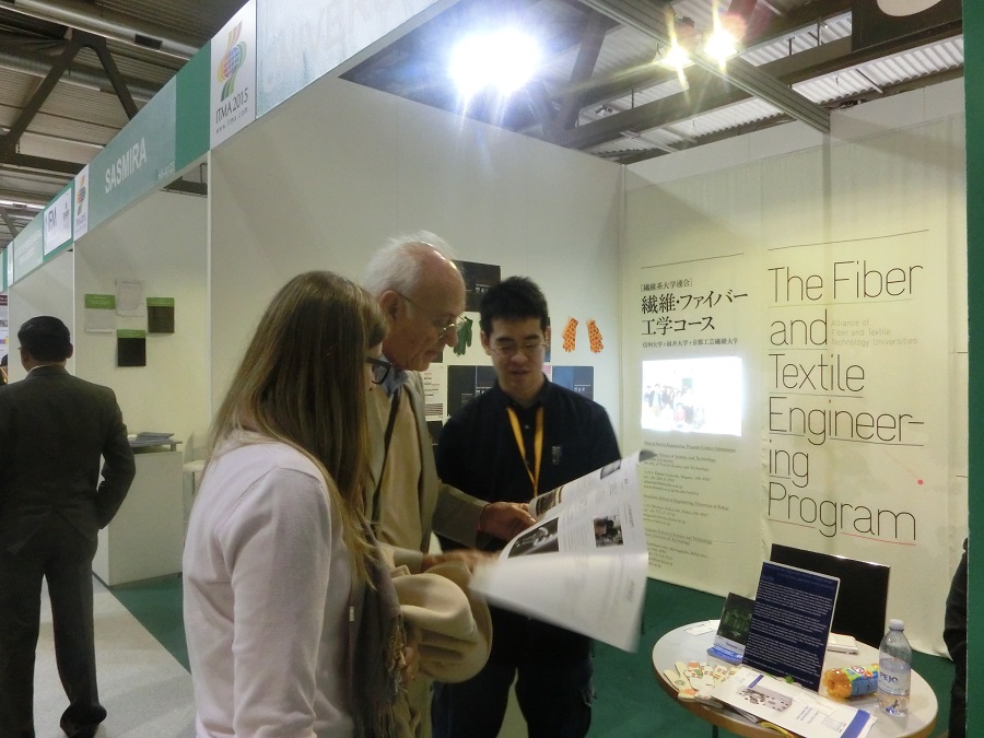 Hiroaki Ishikawa (2nd-year Master student) working at the booth.